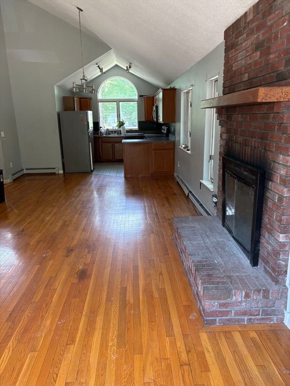 Fireplace, Interior, Kitchen, Pendant Lights, Stone Walls, Wood Texture Flooring