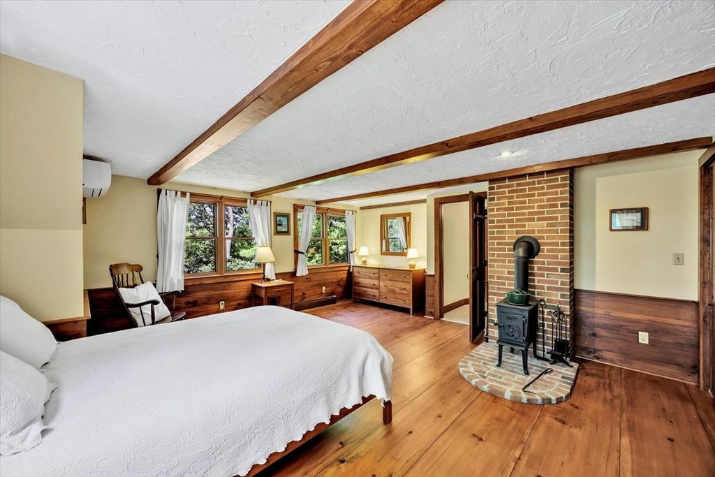 Bedroom, Fireplace, Interior, Recessed Lighting, Stone Walls, Wooden Beams, Wood Texture Flooring
