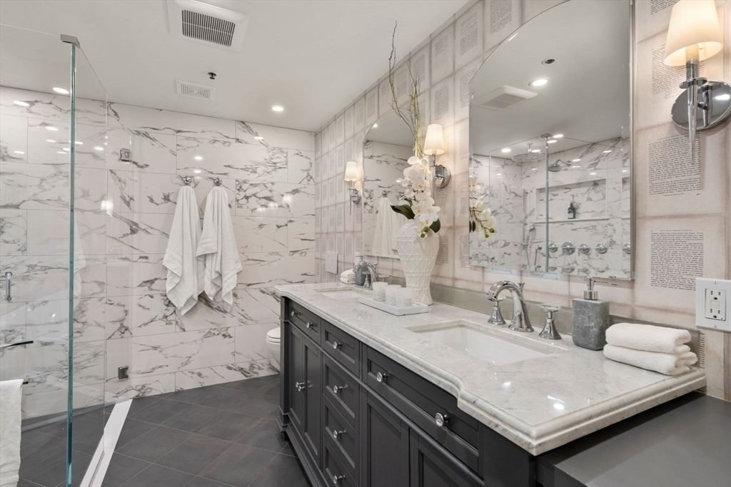 Bathroom, Dual Sink Vanities, Glass Shower, Interior, Marble Walls, Recessed Lighting