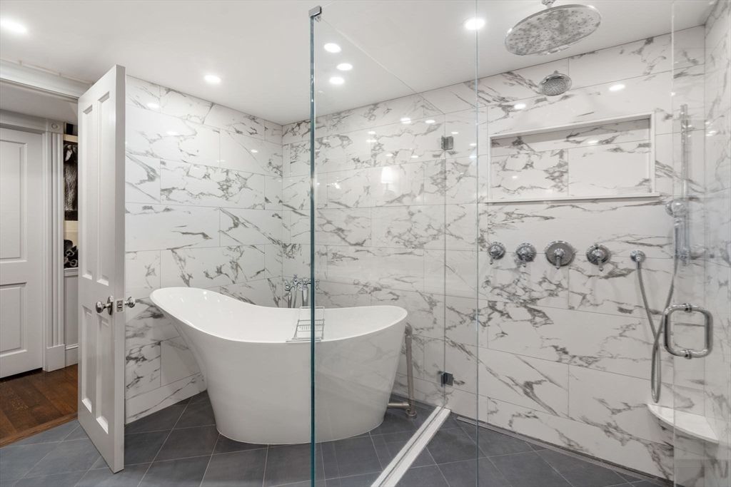 Bathroom, Free Standing Baths, Glass Shower, Interior, Marble Walls, Recessed Lighting, Wood Texture Flooring