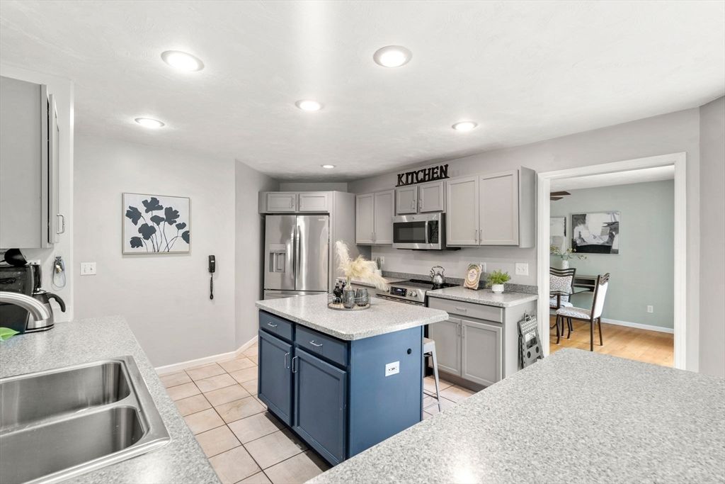 Dining room, Interior, Kitchen, Recessed Lighting, Stainless Steel Appliances, Wood Texture Flooring