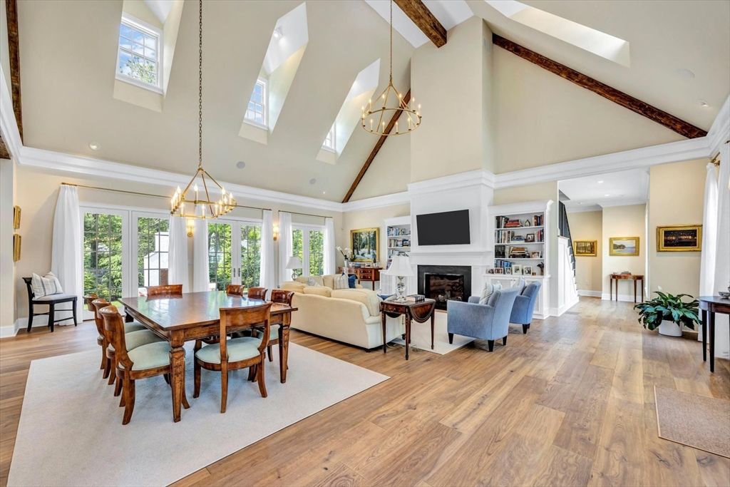 Chandelier, Dining room, Fireplace, Interior, Living room, Pendant Lights, Recessed Lighting, Wooden Beams, Wood Texture Flooring
