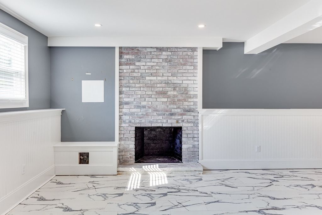 Fireplace, Interior, Marble, Recessed Lighting, Stone Walls