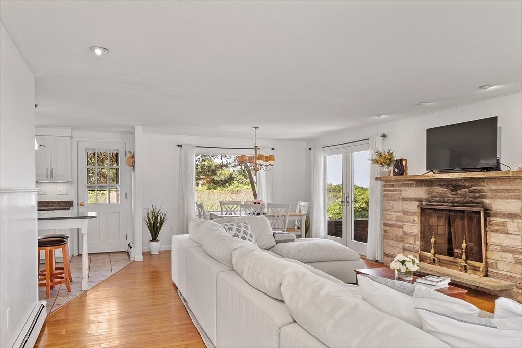 Chandelier, Dining room, Fireplace, Interior, Living room, Recessed Lighting, Wood Texture Flooring