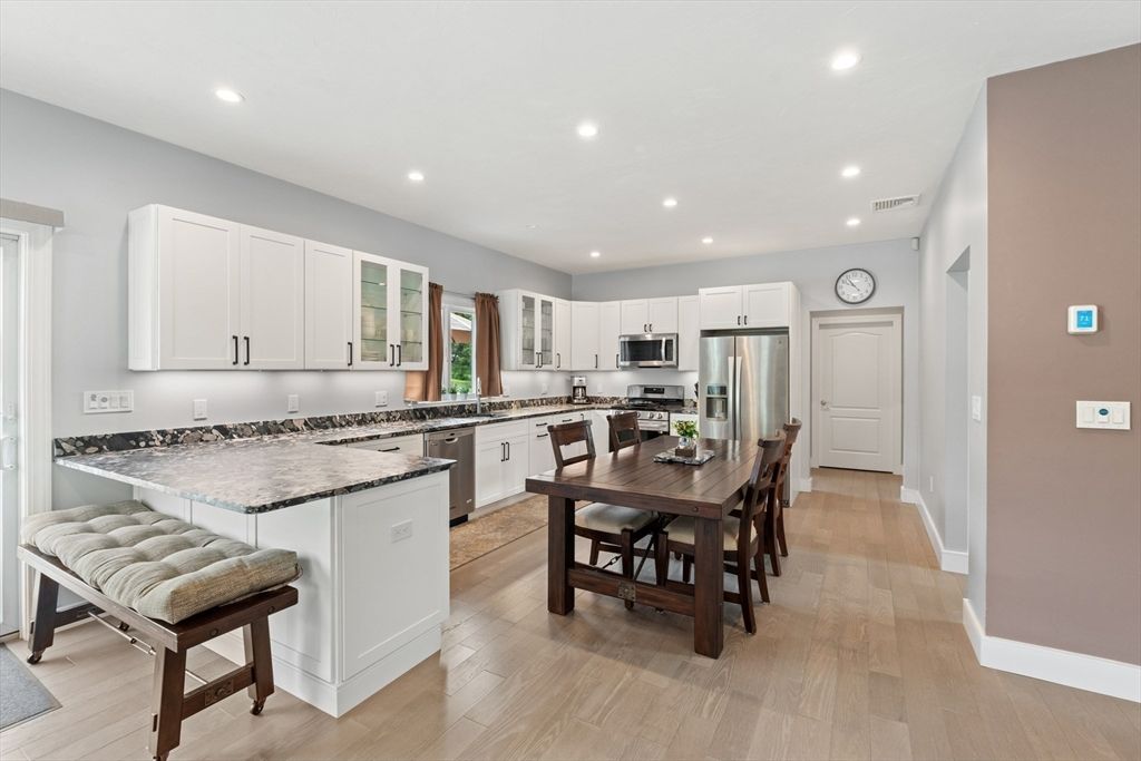 Dining room, Interior, Kitchen, Recessed Lighting, Stainless Steel Appliances, Wood Texture Flooring
