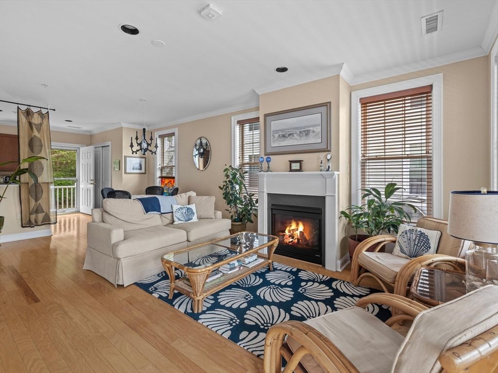 Dining room, Fireplace, Interior, Living room, Pendant Lights, Recessed Lighting, Wood Texture Flooring