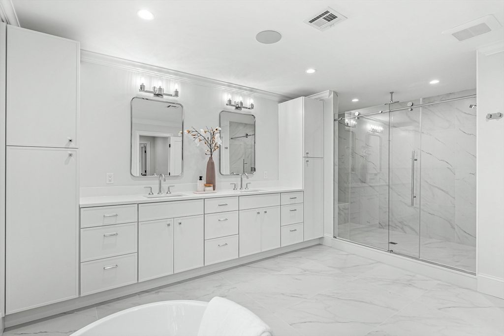 Bathroom, Dual Sink Vanities, Glass Shower, Interior, Marble, Marble Walls, Recessed Lighting