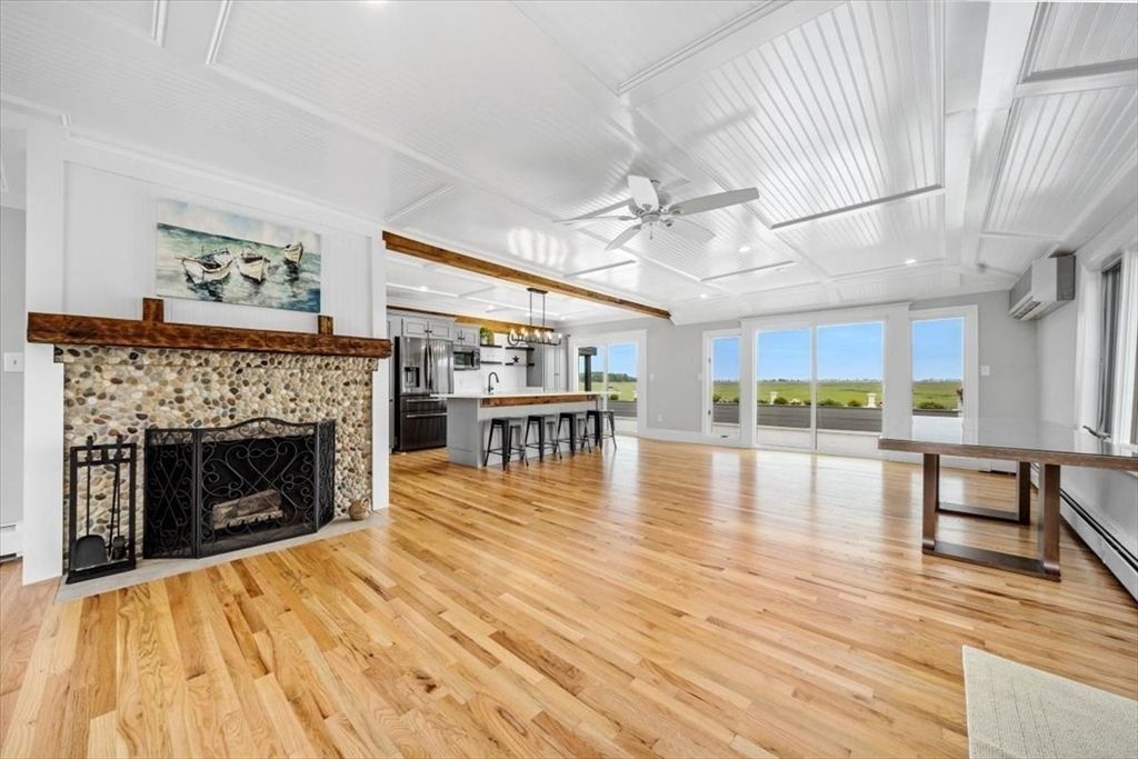 Empty room, Fireplace, Interior, Kitchen, Pendant Lights, Recessed Lighting, Wood Texture Flooring