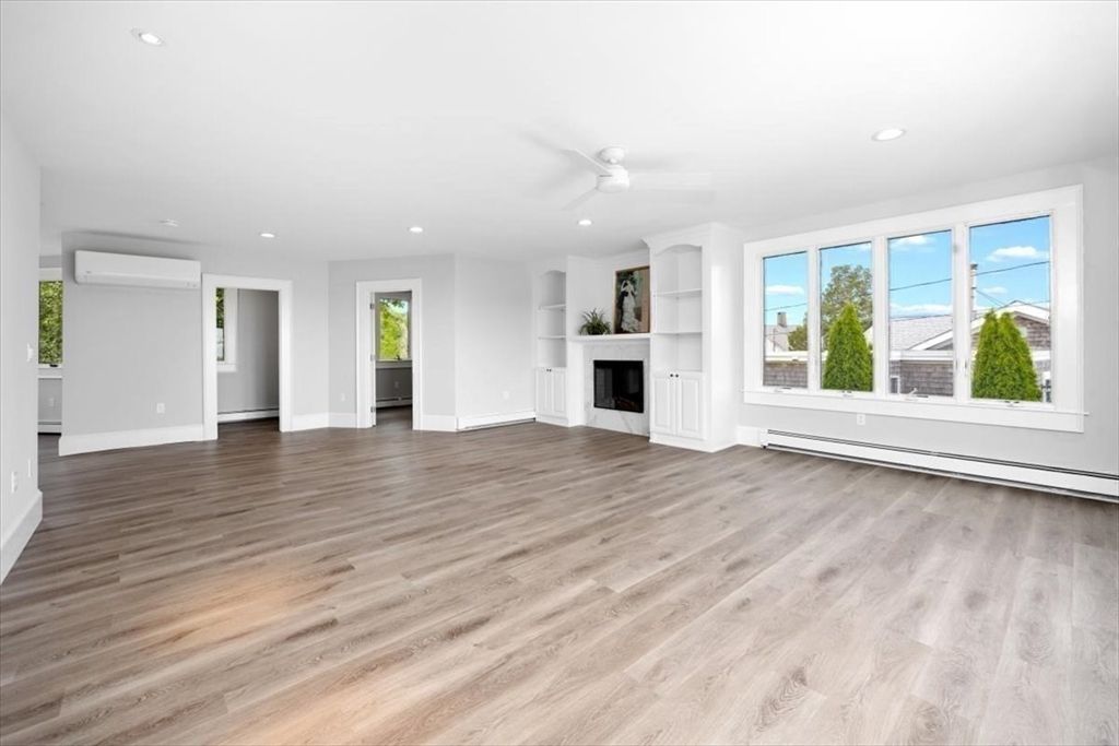 Empty room, Fireplace, Interior, Recessed Lighting, Wood Texture Flooring