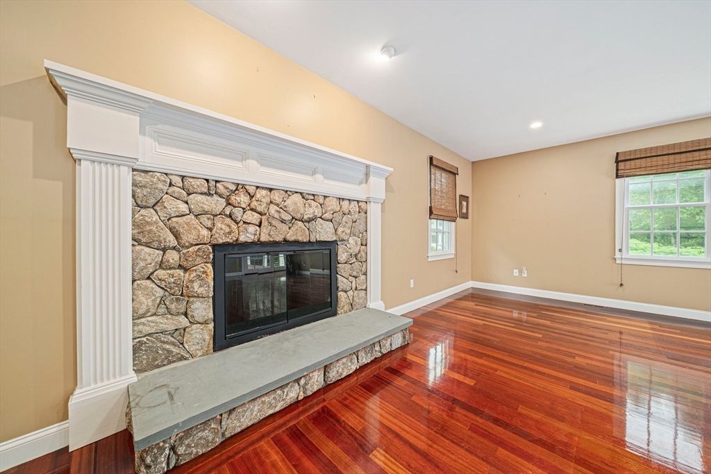 Empty room, Fireplace, Interior, Recessed Lighting, Stone Walls, Wood Texture Flooring