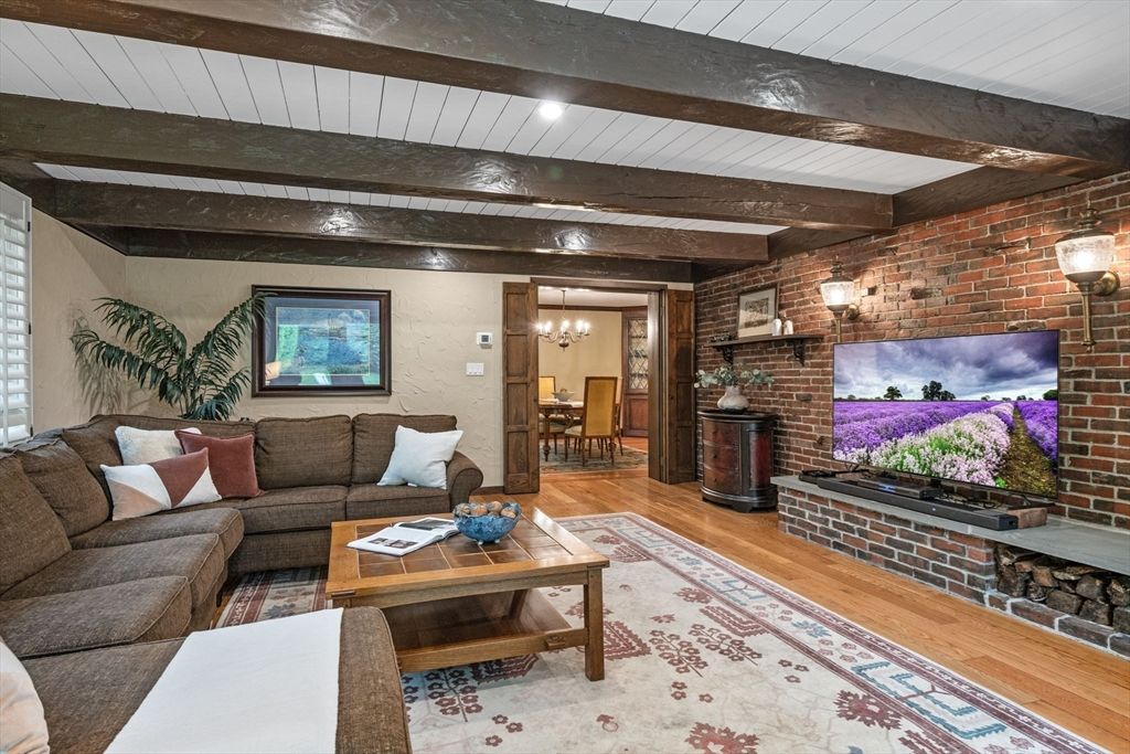 Chandelier, Dining room, Interior, Living room, Stone Walls, Wooden Beams, Wood Texture Flooring