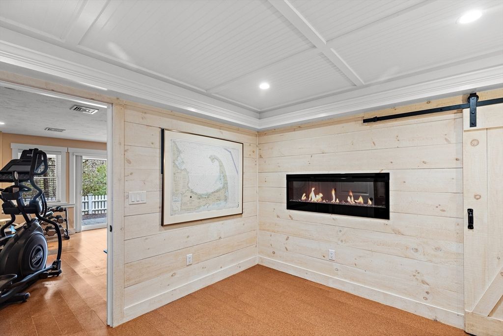 Fireplace, Fitness Equipment, Interior, Recessed Lighting, Wooden Walls