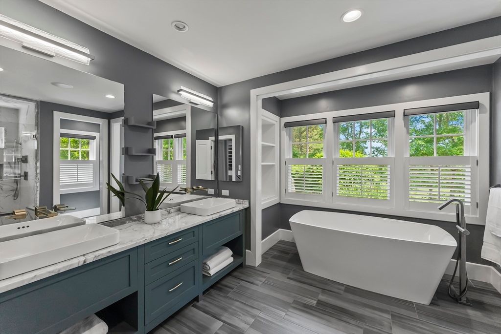 Bathroom, Dual Sink Vanities, Free Standing Baths, Glass Shower, Interior, Recessed Lighting, Wood Texture Flooring