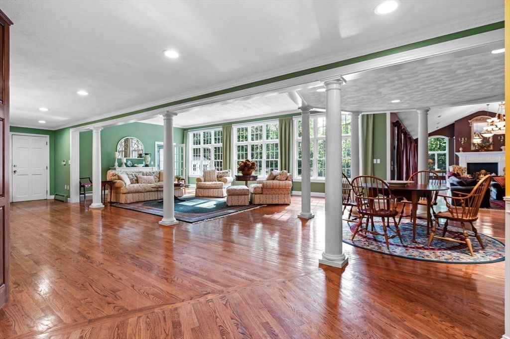Chandelier, Dining room, Fireplace, Interior, Living room, Recessed Lighting, Wood Texture Flooring