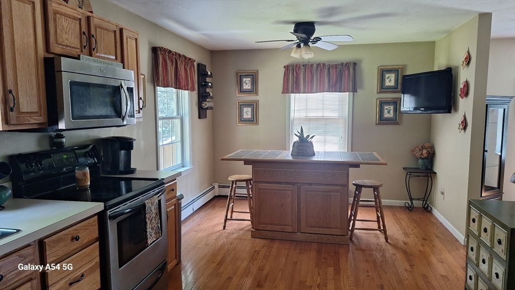 Interior, Kitchen, Tile Countertops, Wood Texture Flooring