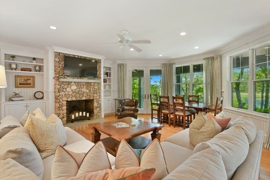 Dining room, Fireplace, Interior, Living room, Recessed Lighting, Wood Texture Flooring