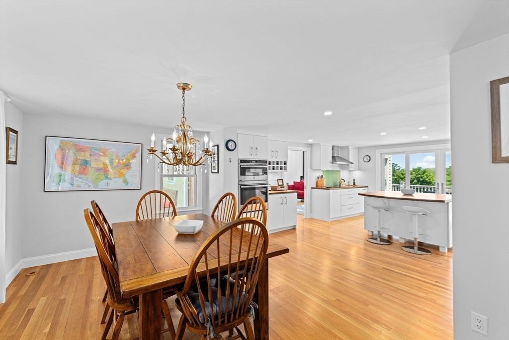 Chandelier, Dining room, Interior, Kitchen, Recessed Lighting, Stainless Steel Appliances, Wood Texture Flooring