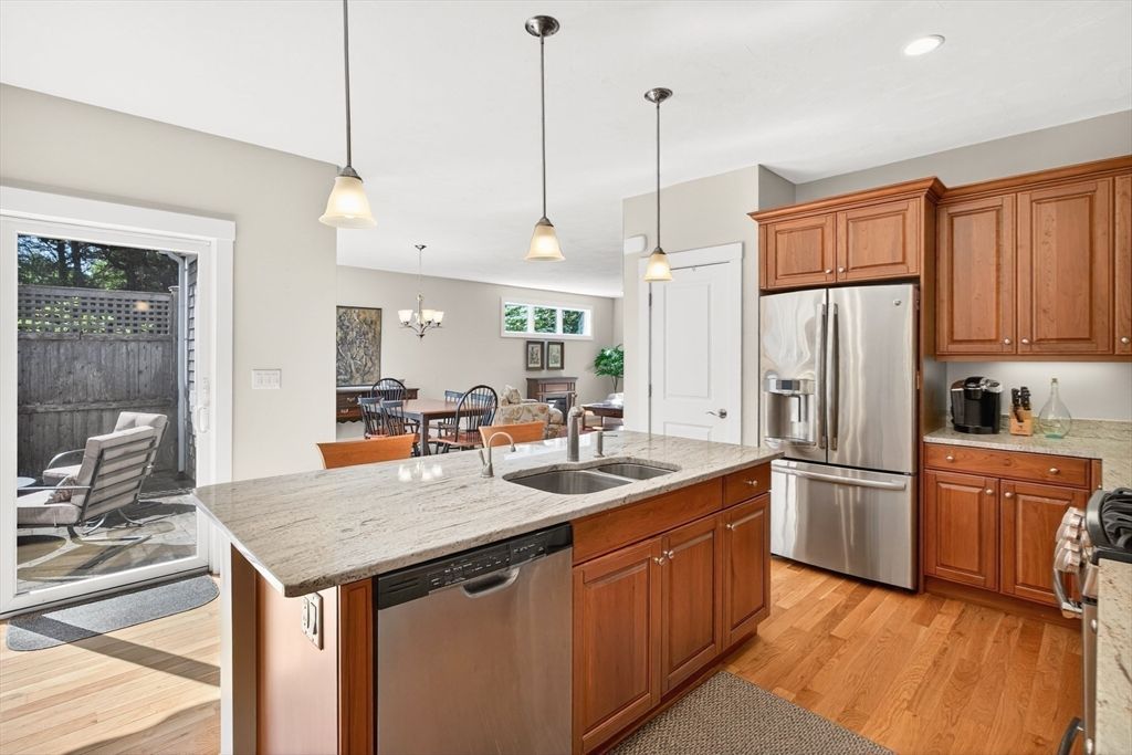 Chandelier, Dining room, Interior, Kitchen, Pendant Lights, Recessed Lighting, Stainless Steel Appliances, Wood Texture Flooring