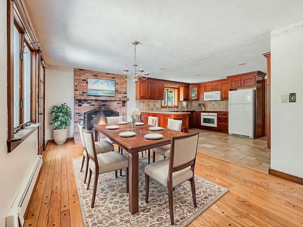 Dining room, Fireplace, Interior, Kitchen, Pendant Lights, Stone Walls, Wood Texture Flooring