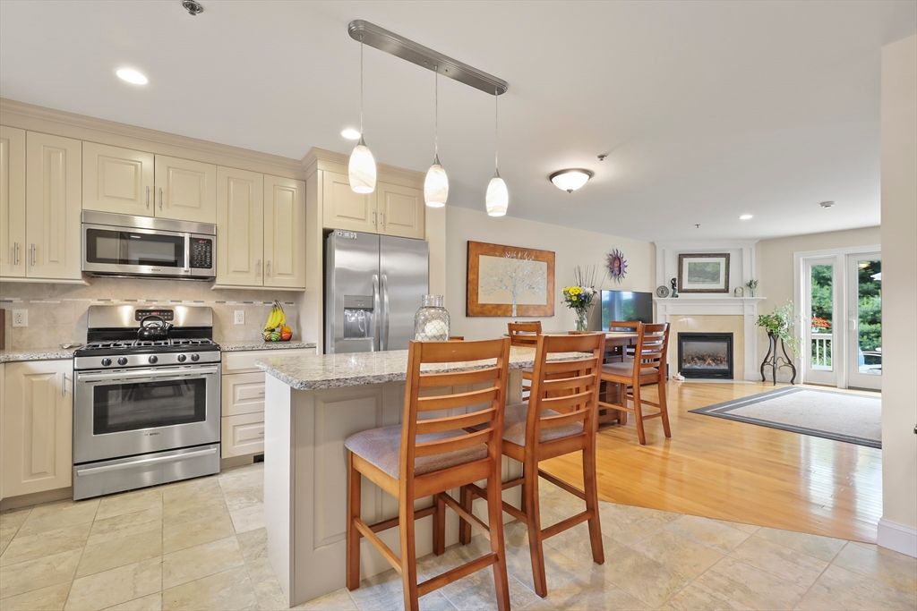 Dining room, Fireplace, Interior, Kitchen, Pendant Lights, Recessed Lighting, Stainless Steel Appliances