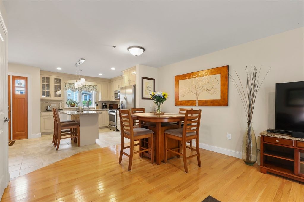 Chandelier, Dining room, Interior, Kitchen, Recessed Lighting, Stainless Steel Appliances, Wood Texture Flooring