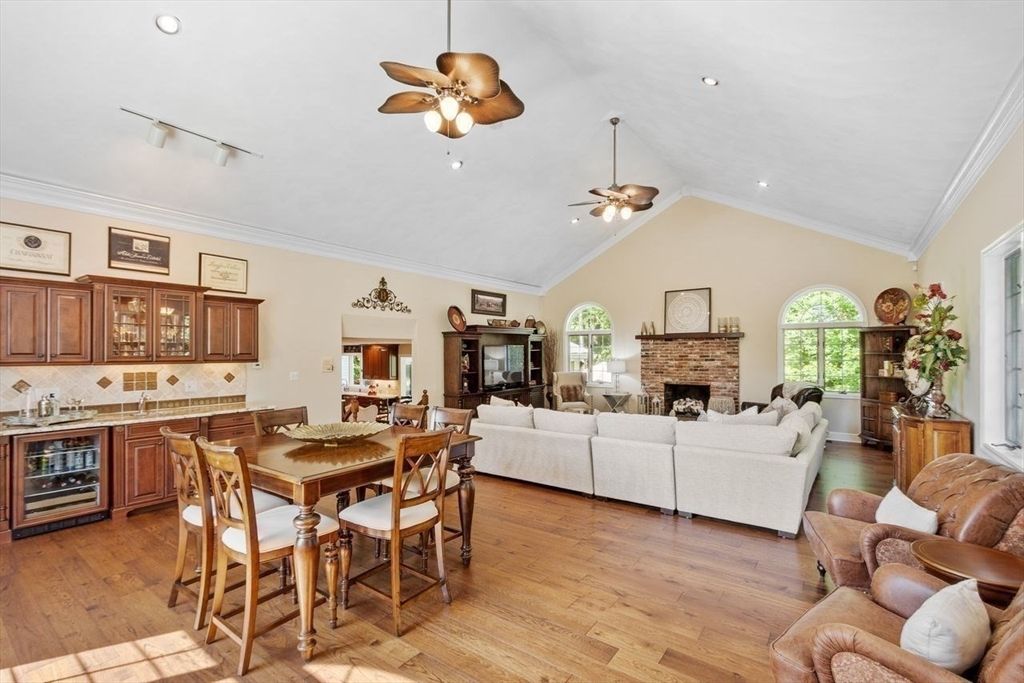 Dining room, Fireplace, Interior, Living room, Recessed Lighting, Wood Texture Flooring