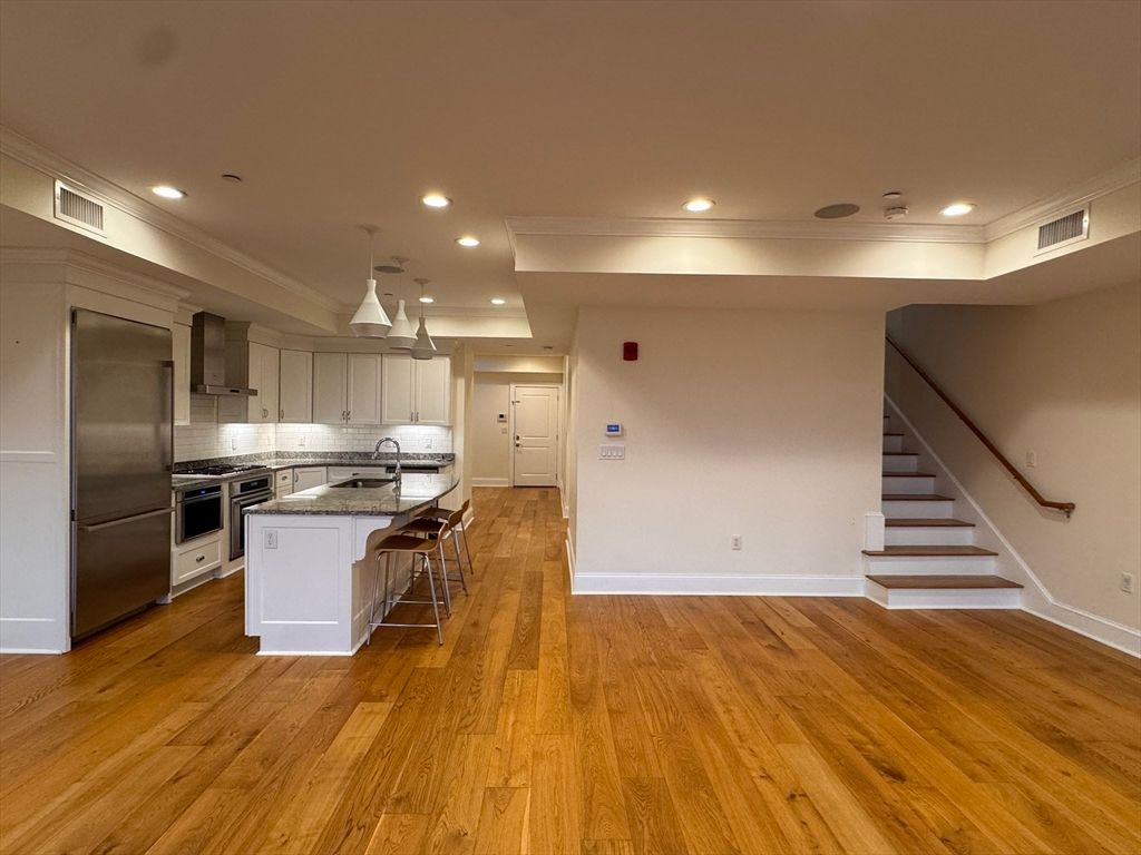 Interior, Kitchen, Pendant Lights, Recessed Lighting, Stainless Steel Appliances, Wood Texture Flooring