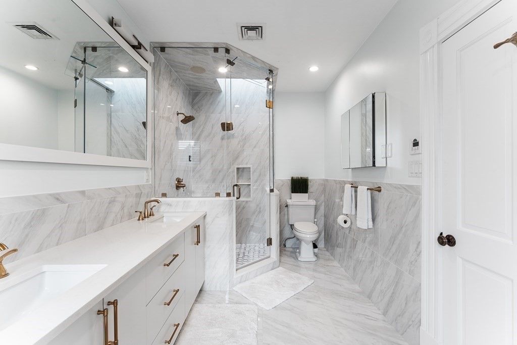 Bathroom, Dual Sink Vanities, Glass Shower, Interior, Marble, Marble Walls, Recessed Lighting