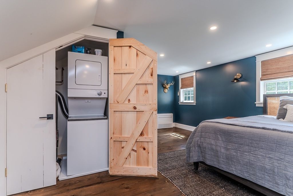 Bedroom, Interior, Recessed Lighting, Utility Closets, Washer, Wood Texture Flooring