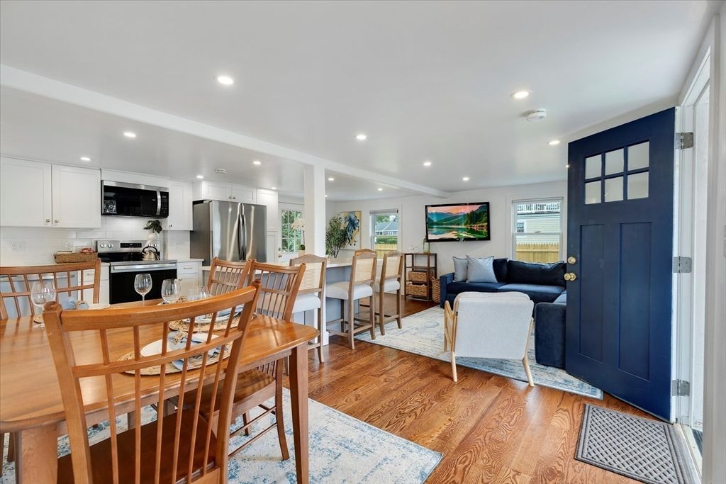 Dining room, Interior, Kitchen, Living room, Recessed Lighting, Stainless Steel Appliances, Wood Texture Flooring