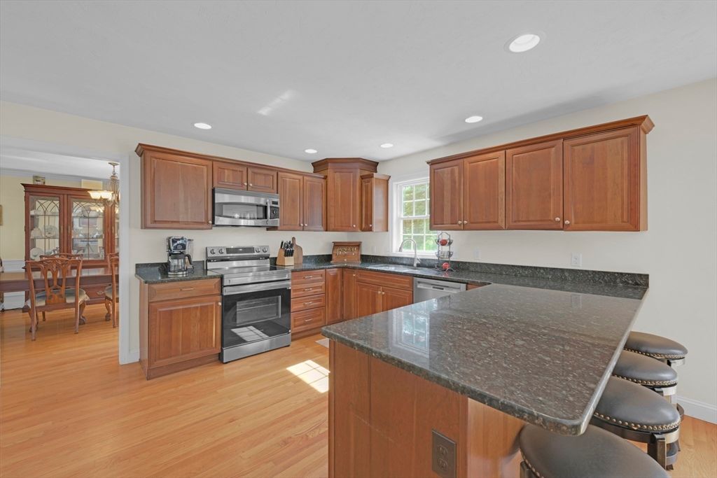 Dining room, Interior, Kitchen, Recessed Lighting, Stainless Steel Appliances, Wood Texture Flooring