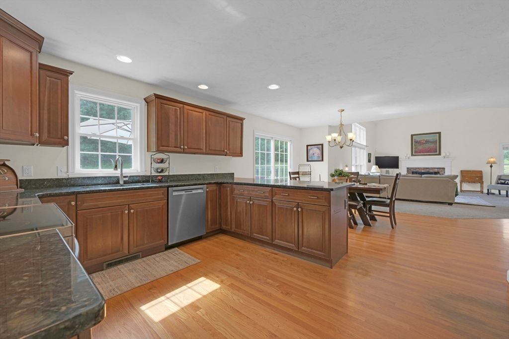 Chandelier, Dining room, Fireplace, Interior, Kitchen, Living room, Recessed Lighting, Wood Texture Flooring