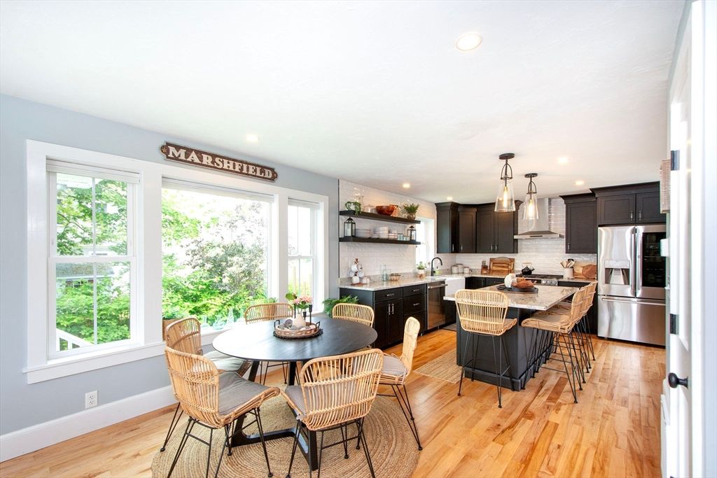 Dining room, Interior, Kitchen, Pendant Lights, Recessed Lighting, Stainless Steel Appliances, Wood Texture Flooring