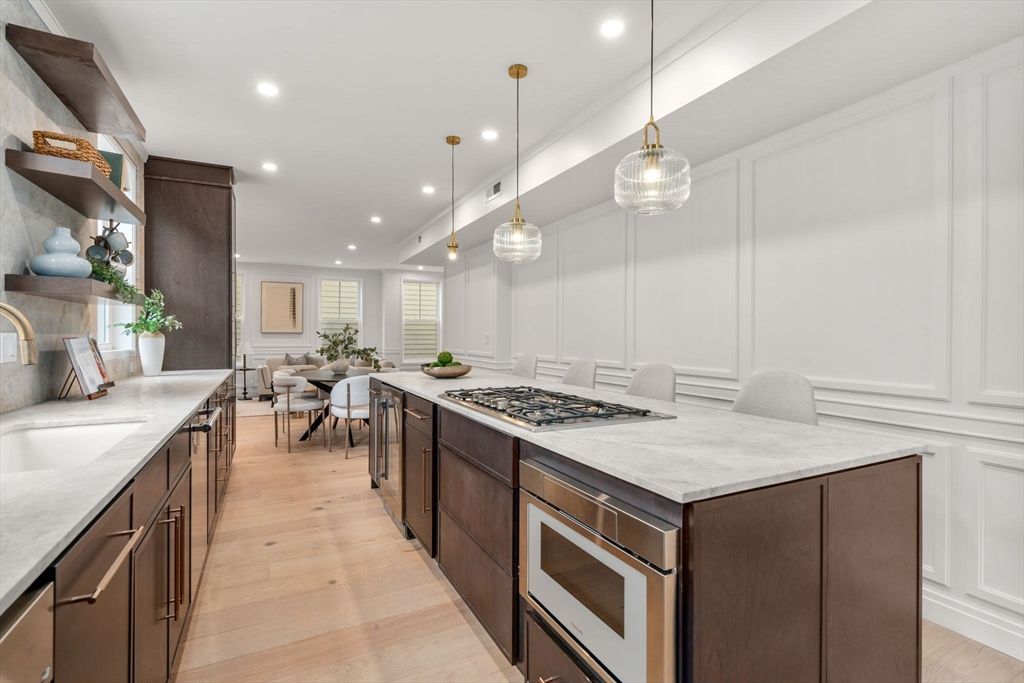 Dining room, Interior, Kitchen, Pendant Lights, Recessed Lighting, Stainless Steel Appliances, Wood Texture Flooring