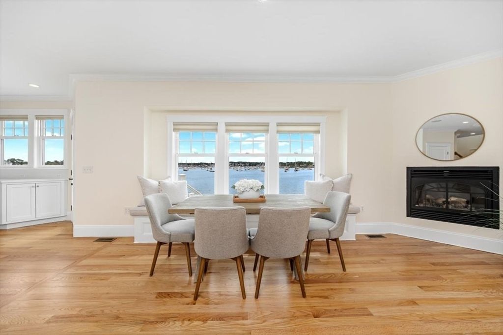 Dining room, Fireplace, Interior, Recessed Lighting, Water, Wood Texture Flooring
