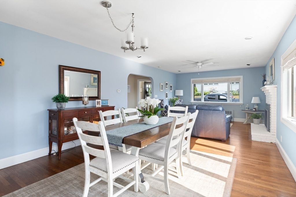 Dining room, Fireplace, Interior, Living room, Recessed Lighting, Wood Texture Flooring