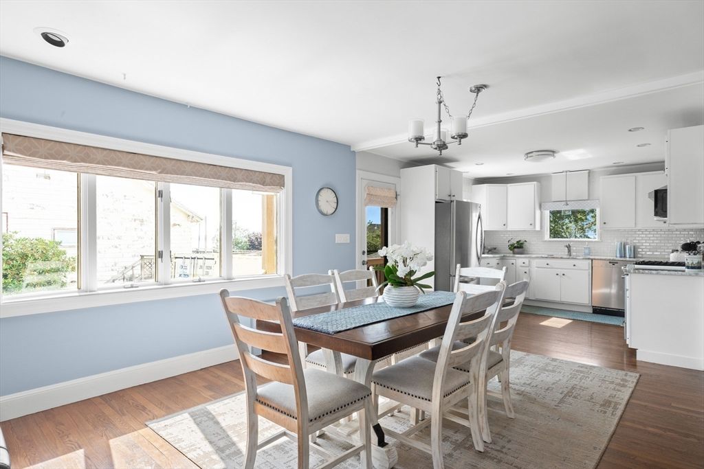 Chandelier, Dining room, Interior, Kitchen, Pendant Lights, Recessed Lighting, Stainless Steel Appliances, Wood Texture Flooring