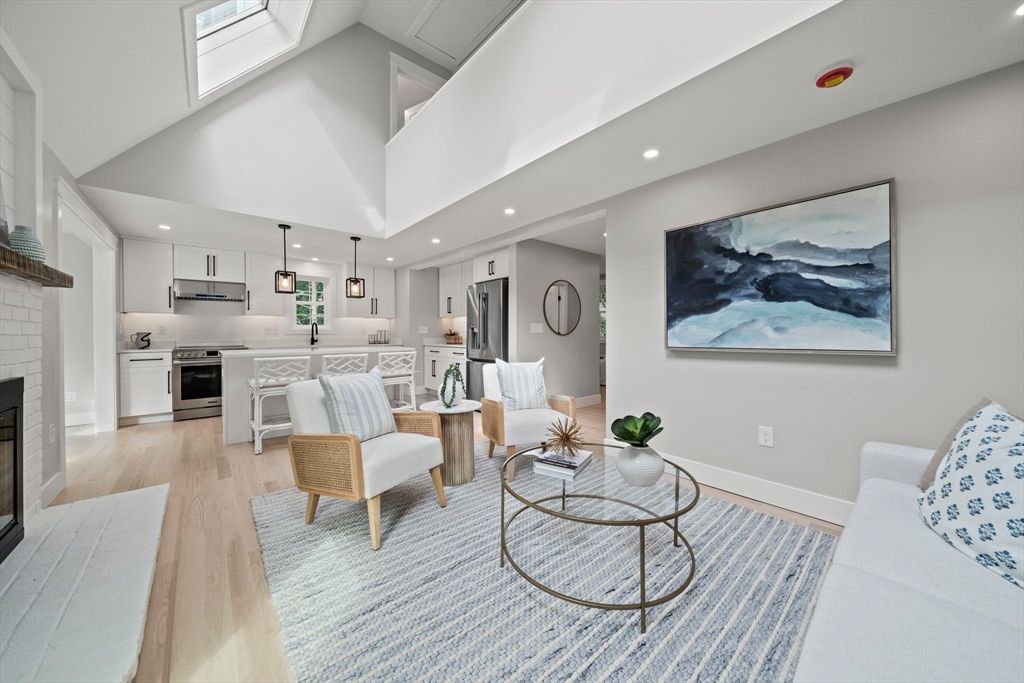 Fireplace, Interior, Kitchen, Living room, Pendant Lights, Recessed Lighting, Stainless Steel Appliances, Wood Texture Flooring