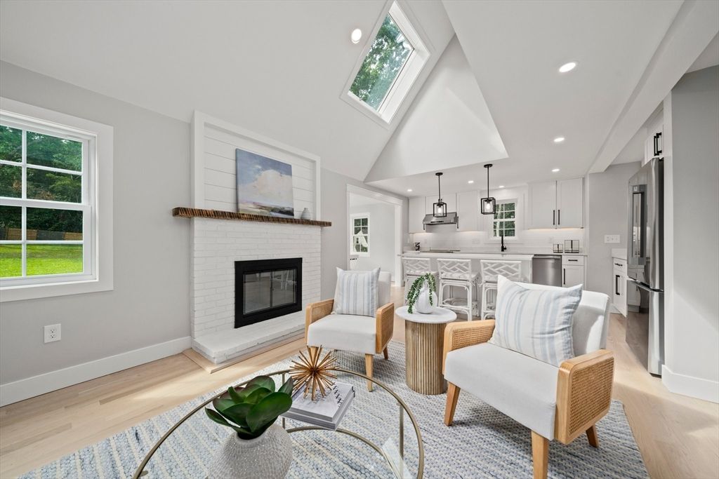 Dining room, Fireplace, Interior, Kitchen, Pendant Lights, Recessed Lighting, Stainless Steel Appliances, Wood Texture Flooring