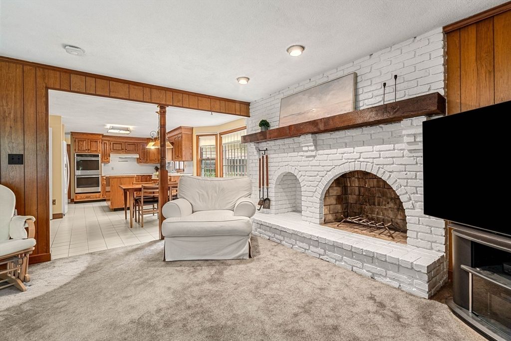 Dining room, Fireplace, Interior, Kitchen, Pendant Lights, Recessed Lighting, Stainless Steel Appliances, Stone Walls