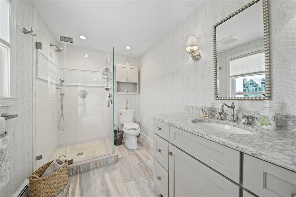 Bathroom, Dual Sink Vanities, Glass Shower, Interior, Recessed Lighting, Wood Texture Flooring