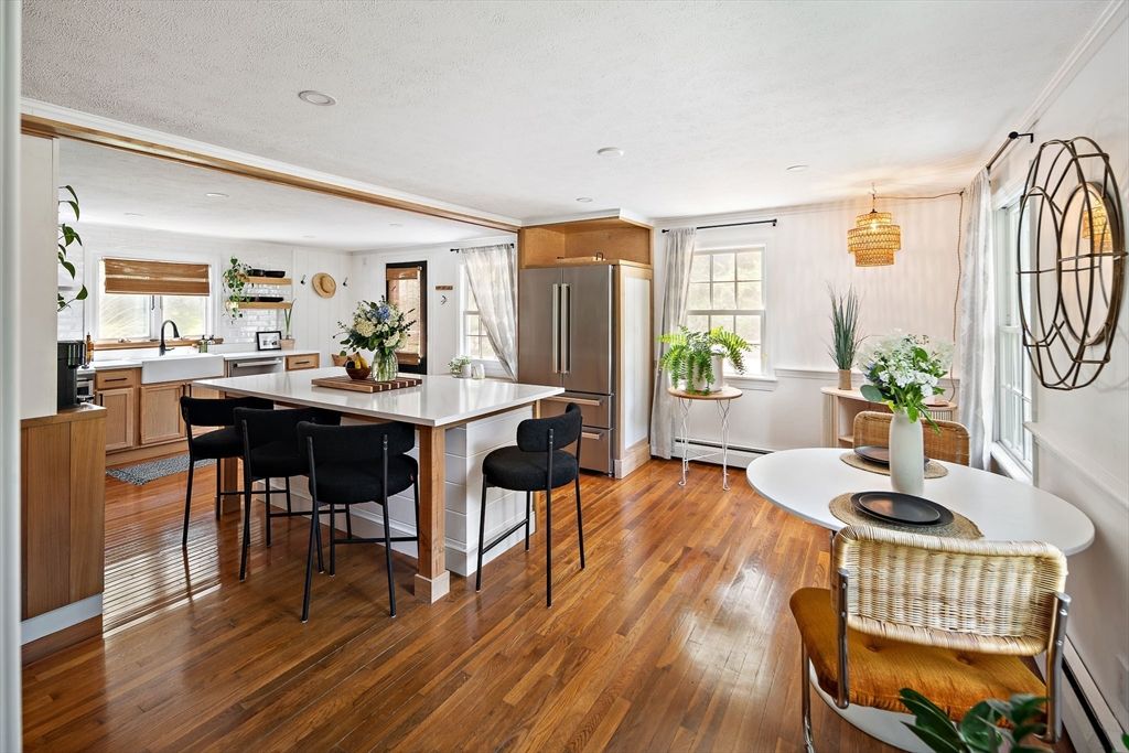 Dining room, Interior, Kitchen, Pendant Lights, Recessed Lighting, Stainless Steel Appliances, Wood Texture Flooring