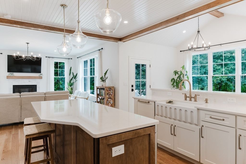 Chandelier, Fireplace, Interior, Kitchen, Living room, Pendant Lights, Recessed Lighting, Wooden Beams, Wood Texture Flooring