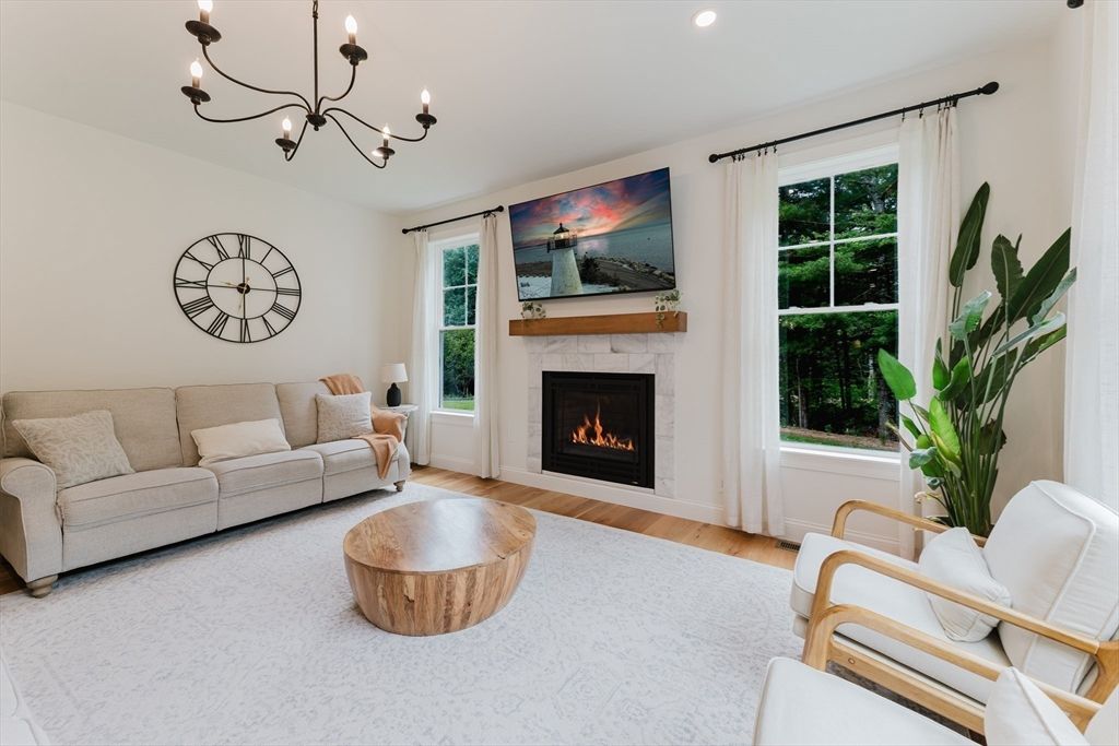 Chandelier, Fireplace, Interior, Living room, Recessed Lighting, Wood Texture Flooring