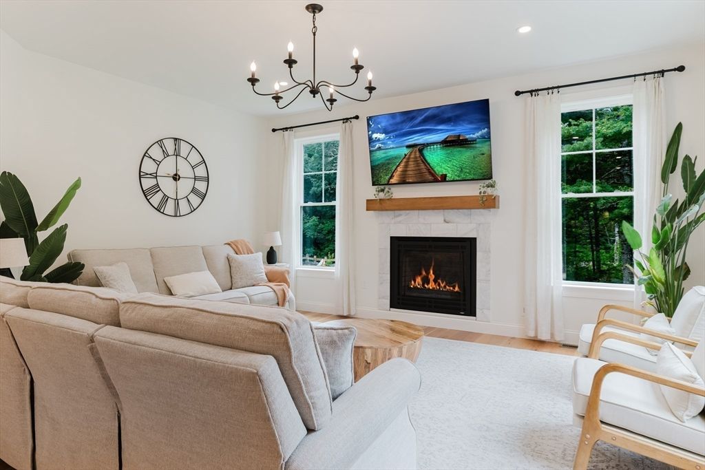 Chandelier, Fireplace, Interior, Living room, Recessed Lighting, Wood Texture Flooring