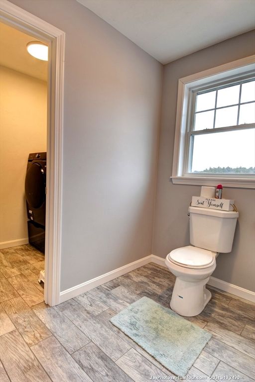 Bathroom, Interior, Recessed Lighting, Washer, Wood Texture Flooring