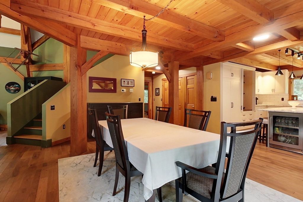 Dining room, Fireplace, Interior, Pendant Lights, Recessed Lighting, Wooden Beams, Wooden Ceilings, Wood Texture Flooring