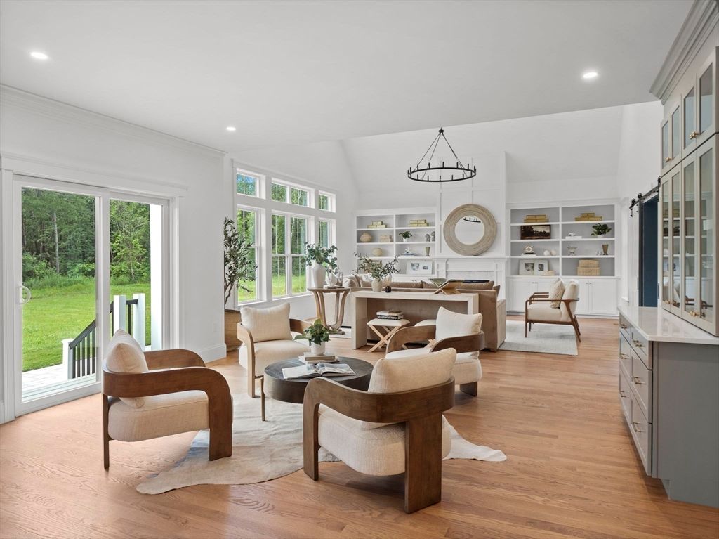 Dining room, Fireplace, Interior, Living room, Pendant Lights, Recessed Lighting, Wood Texture Flooring