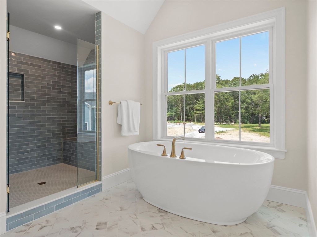 Bathroom, Free Standing Baths, Glass Shower, Interior, Marble, Recessed Lighting, Stone Walls