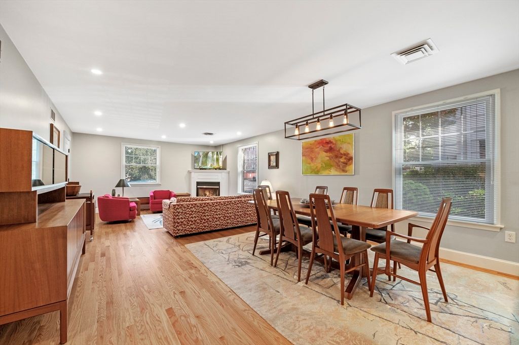 Dining room, Fireplace, Interior, Living room, Pendant Lights, Recessed Lighting, Wood Texture Flooring